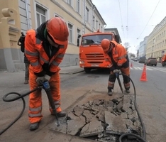 Дорожные работы с воздушный передвижным компрессором